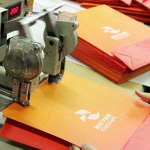 Factory hot stamping machine printing custom gold metallic logo on red paper bag