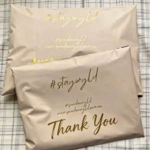Custom nude returnable poly mailer bag with gold foil printed logo and Thank You messaging