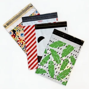 Collection of custom printed PE mailing bags with various patterns including tropical palm leaf, cute panda, and red stripe designs