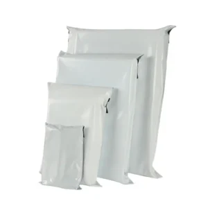 Stack of plain white post-consumer recycled poly mailers shown in four nested sizes for eco-friendly shipping