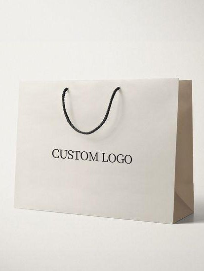 Custom white paper gift bag with logo