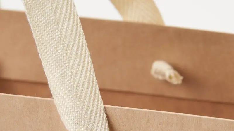 Sleek die-cut cutout handles for modern minimalist paper gift bags