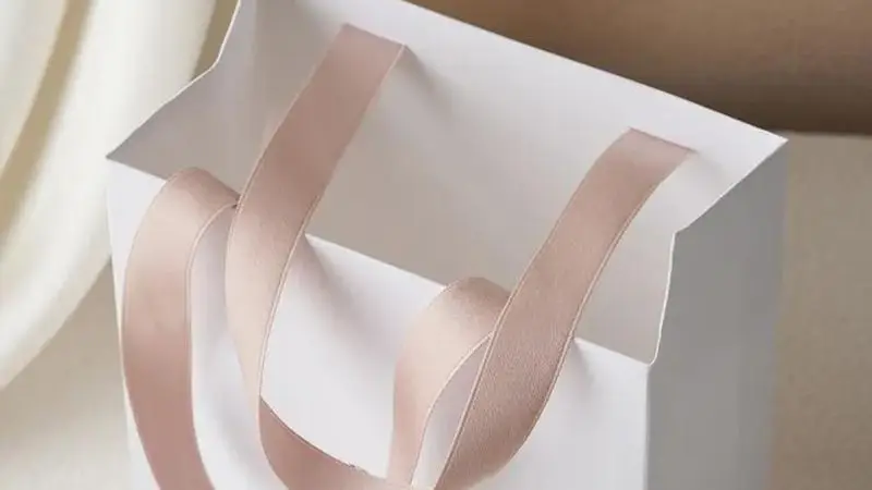 Soft satin ribbon handles for luxury boutique gift paper bags