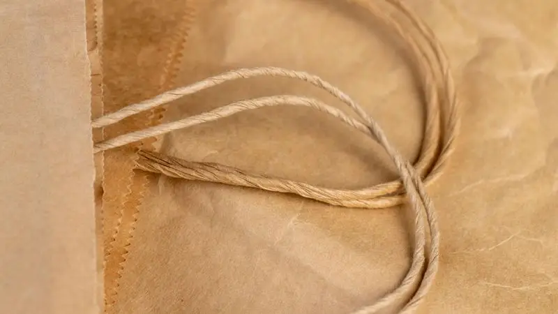 Durable woven cotton rope handles for heavy duty retail paper bags