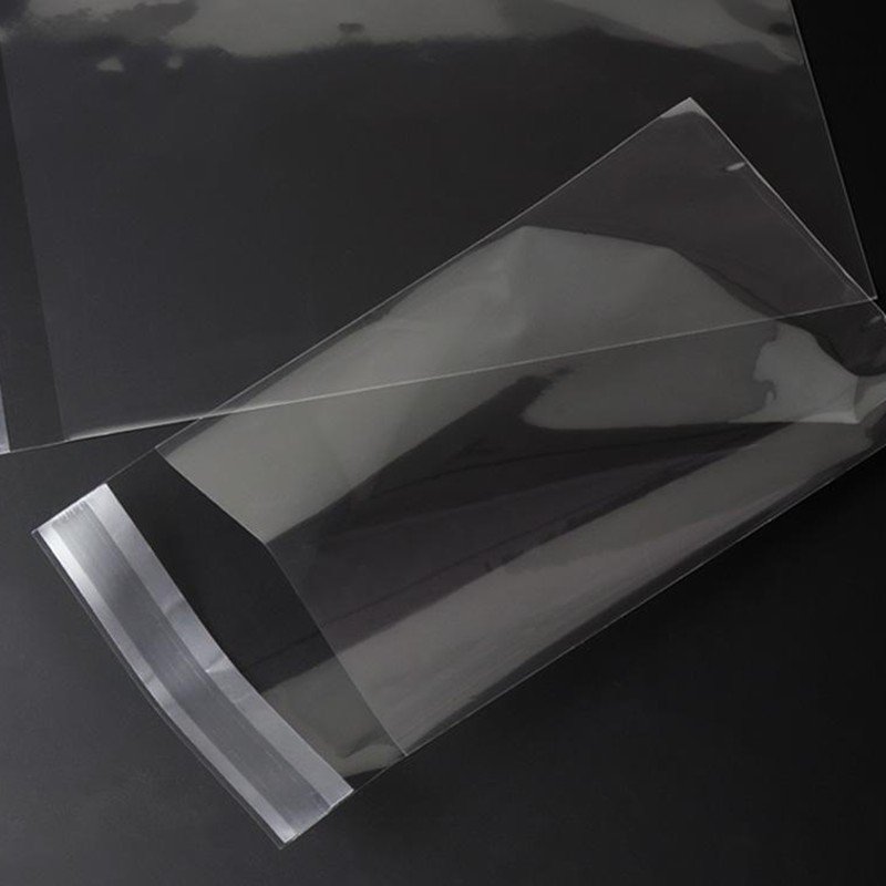 High transparency clear plastic bags with adhesive sealing strip for clothing retail