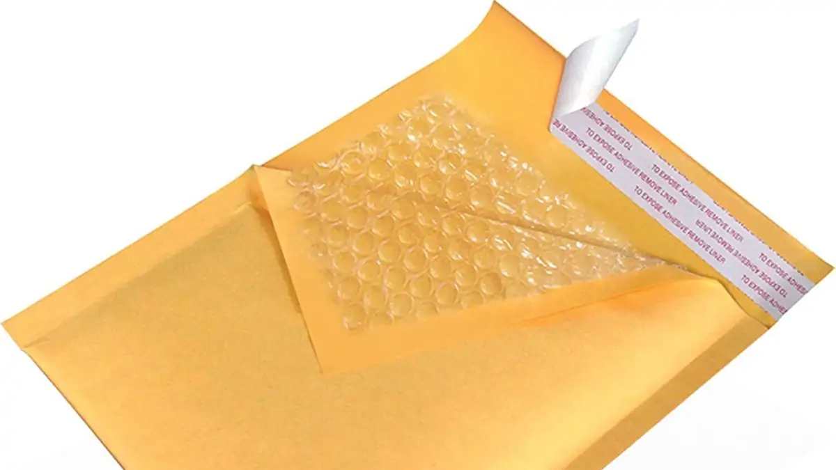 Two-way dual peel-and-seal adhesive strips on returnable recycled bubble mailer for easy e-commerce returns