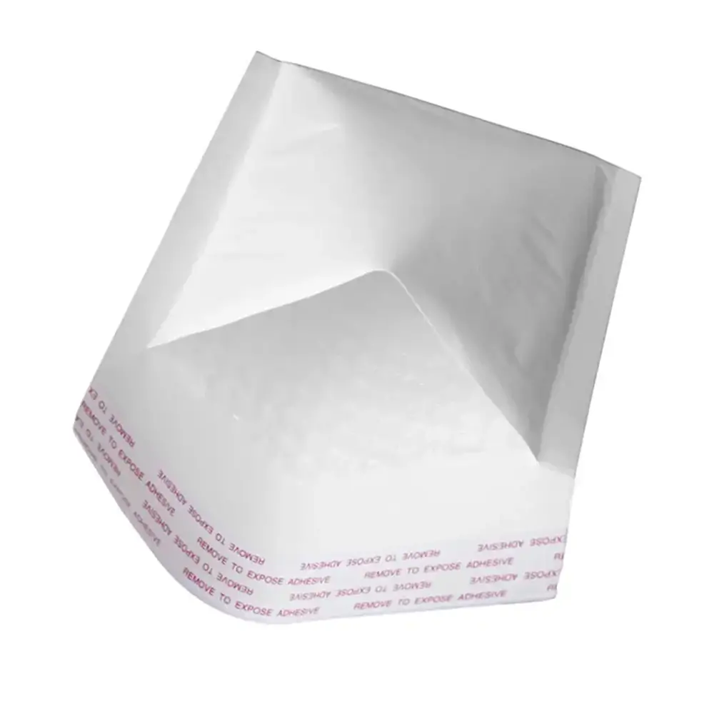 Top view of an opened white kraft bubble mailer displaying interior white bubble lining and adhesive flap