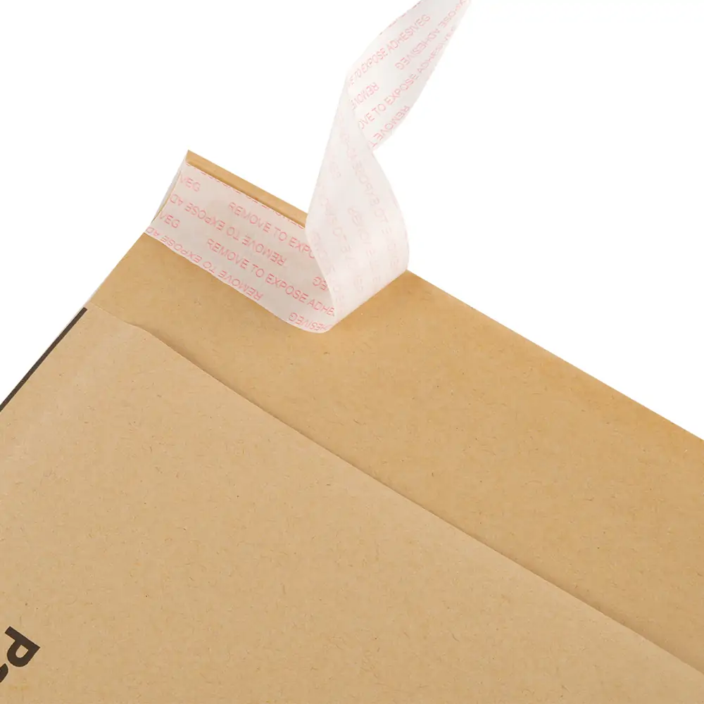 Self-seal peel-off adhesive strip on a brown kraft bubble mailer bag